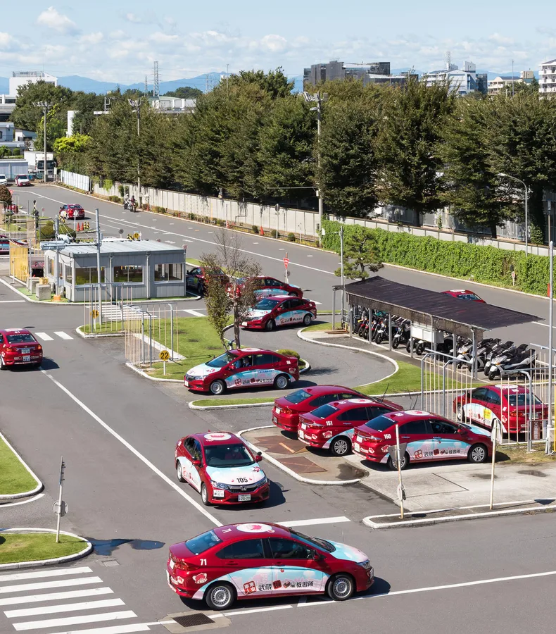 Training cars on the school's driving course
